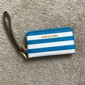 Michael Kors blue and white striped wristlet